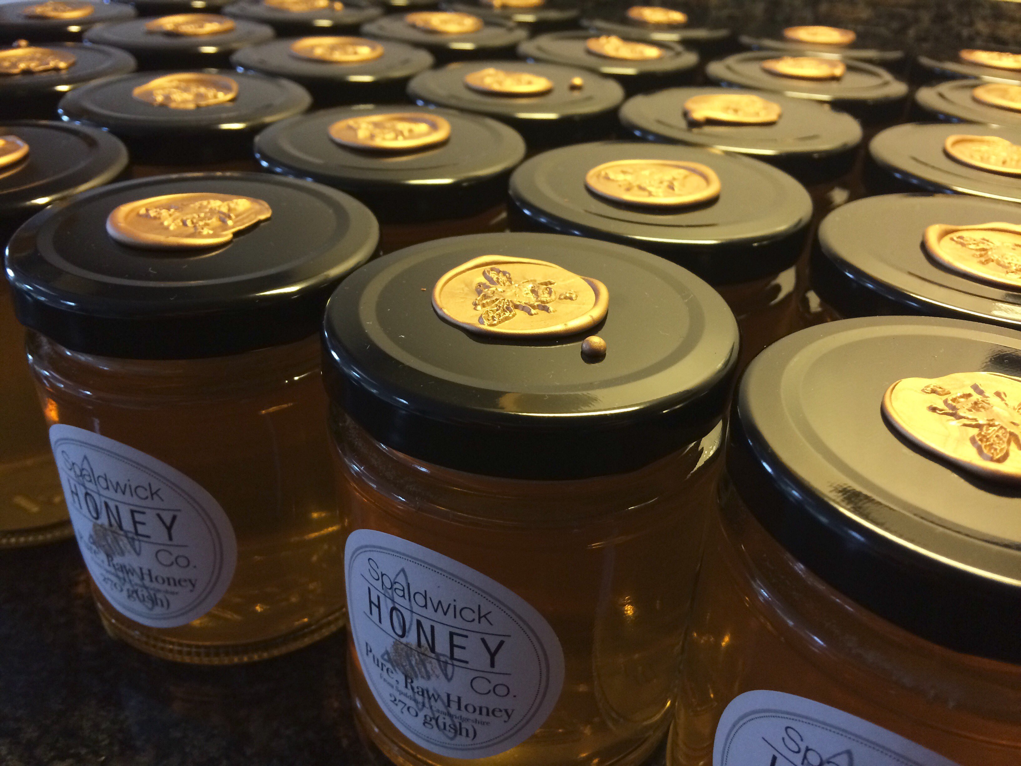 Jars of handmade Pure Raw Local Honey